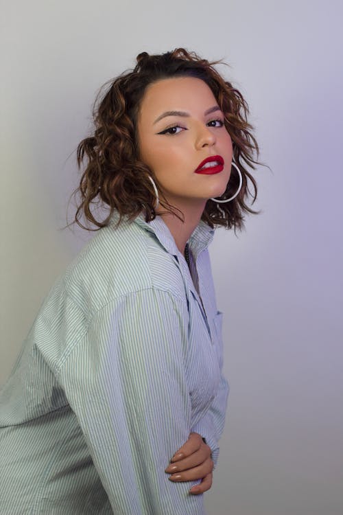 Young Woman Wearing a Blue Shirt and Red Lipstick