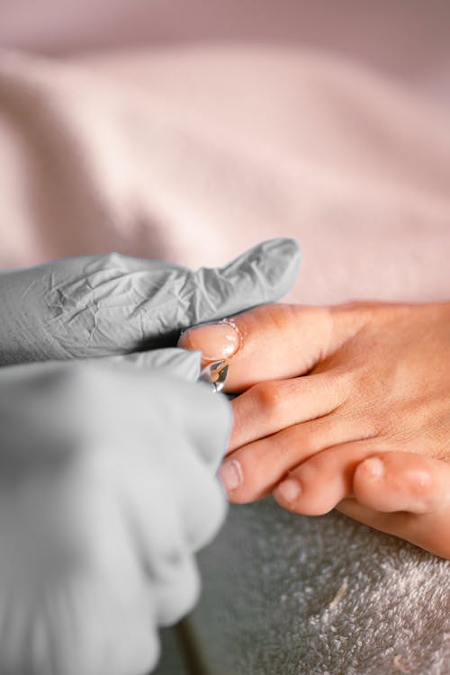 Close-up of a Person Getting Pedicure Done 