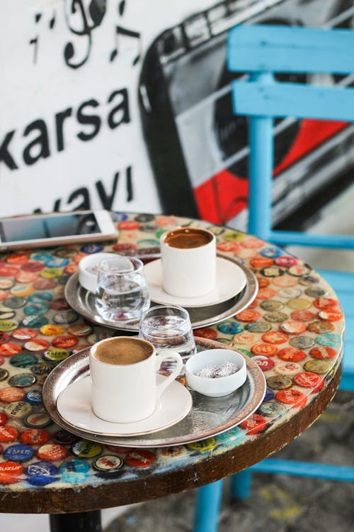 Two Cups of Espresso on the Table in a Cafe 