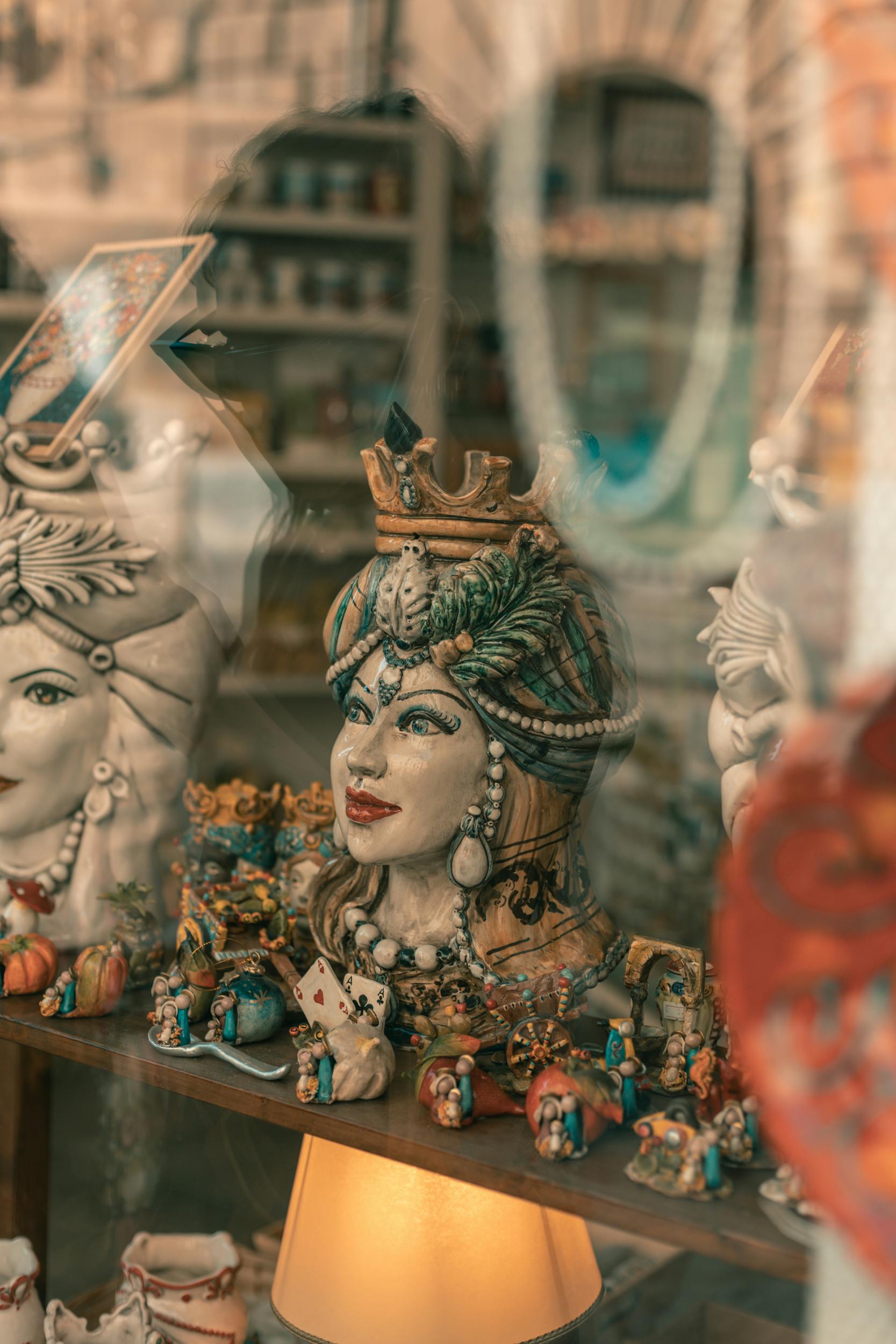 Traditional Sicilian Ceramic Head Statues on a Shop Display · Free