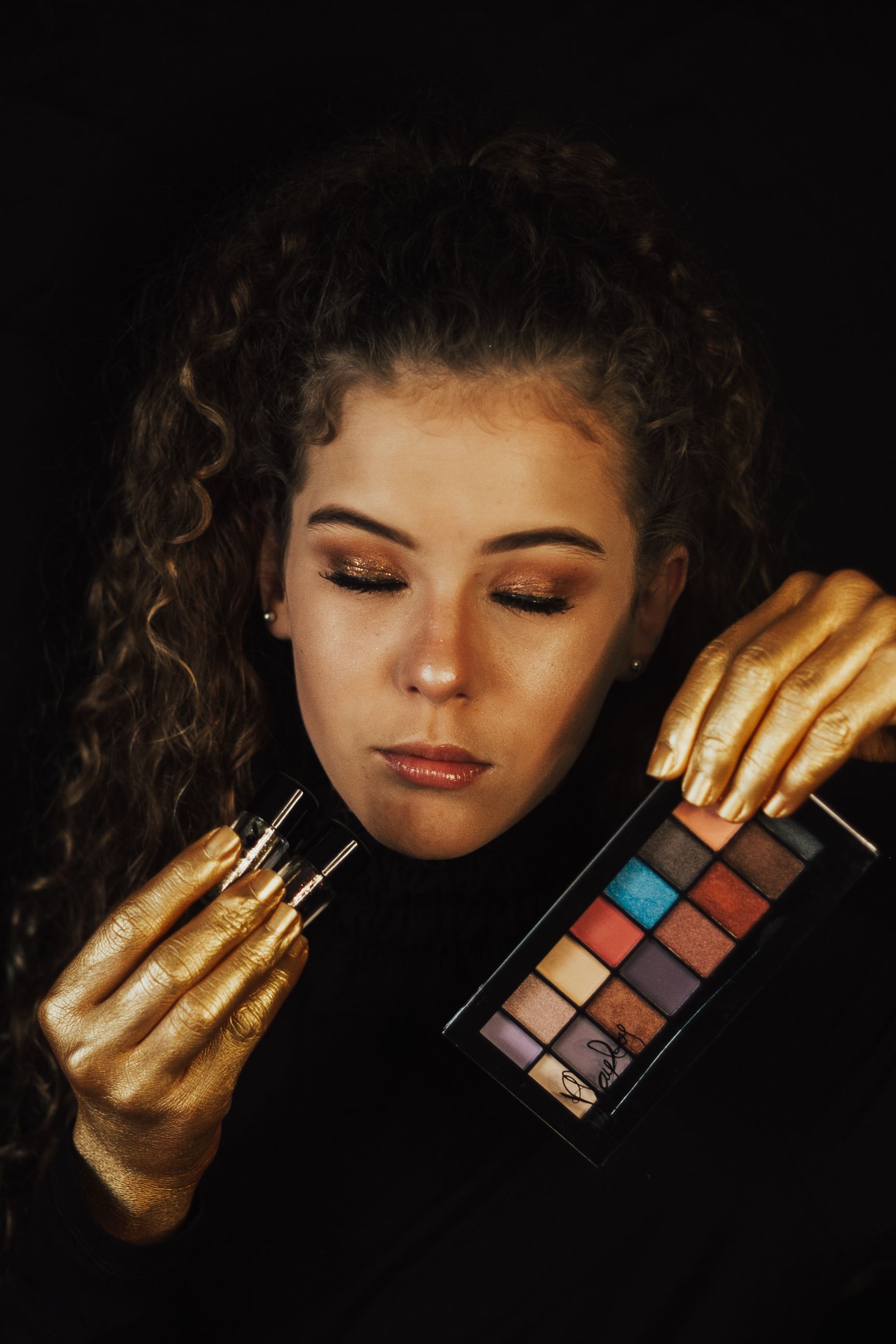 Palette de fards or et bordeaux