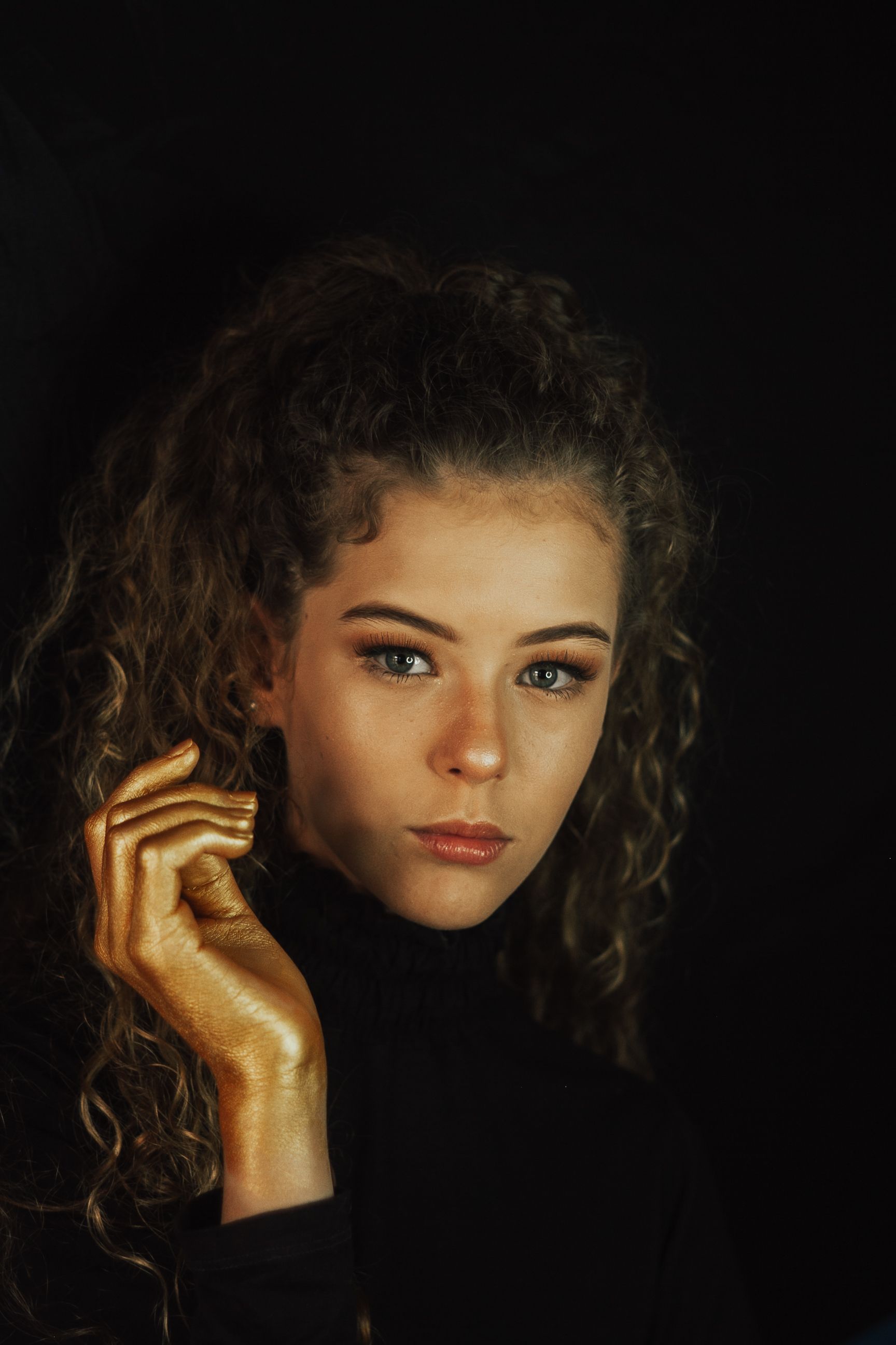 Portrait of Woman with Curly Hair · Free Stock Photo