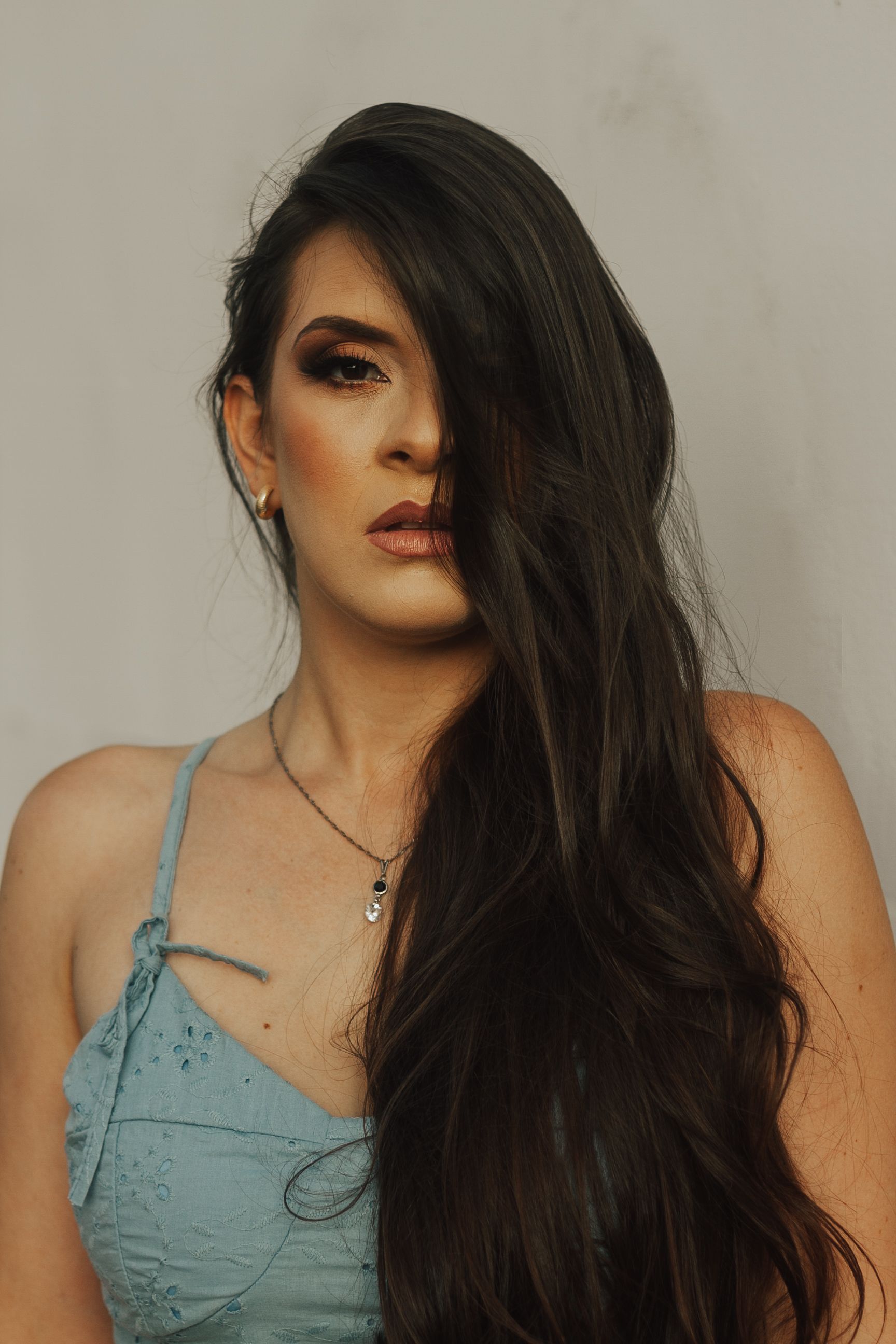 Long Haired Brunette Woman Posing in Light Blue Summer Dress · Free ...