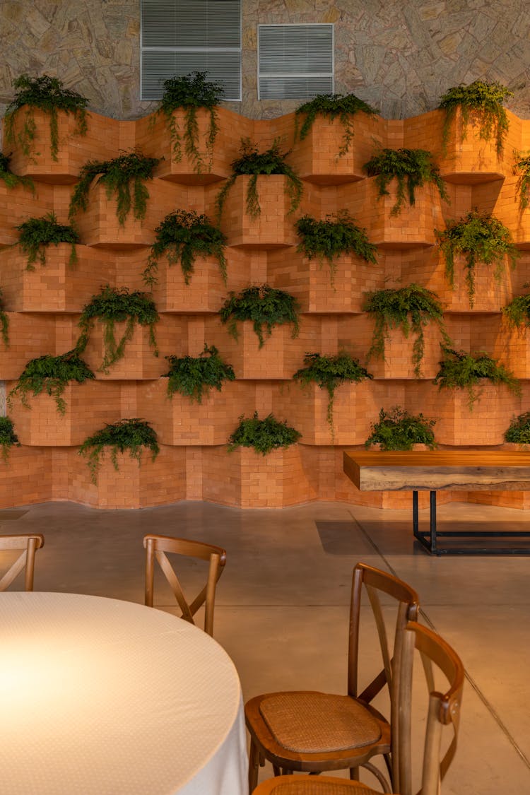 Decorative Wall Of Brick Pots In A Restaurant