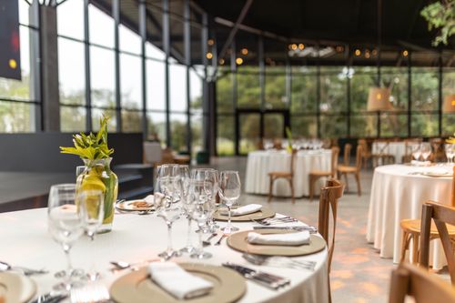 Free Beautifully decorated dining tables in a modern restaurant setting. Stock Photo