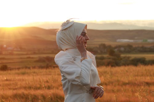 Woman in Hijab Posing in White Clothes