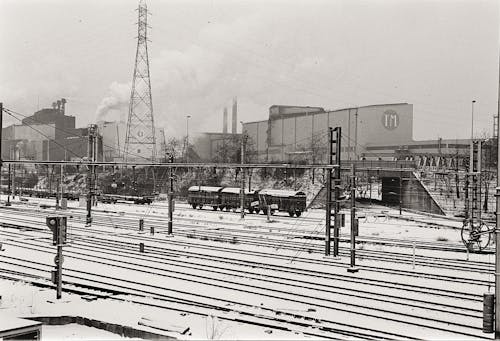 Railway Tracks Covered with Snow in Black and White 