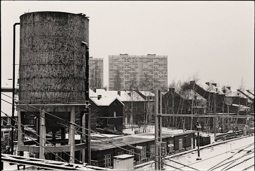 Industry Buildings by the Railway Tracks in Black and White 