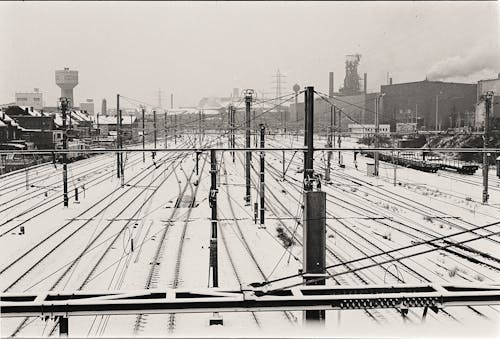 Railway Tracks Covered with Snow in Black and White 