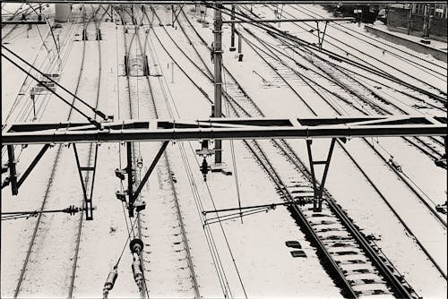Railway Tracks Covered with Snow in Black and White 