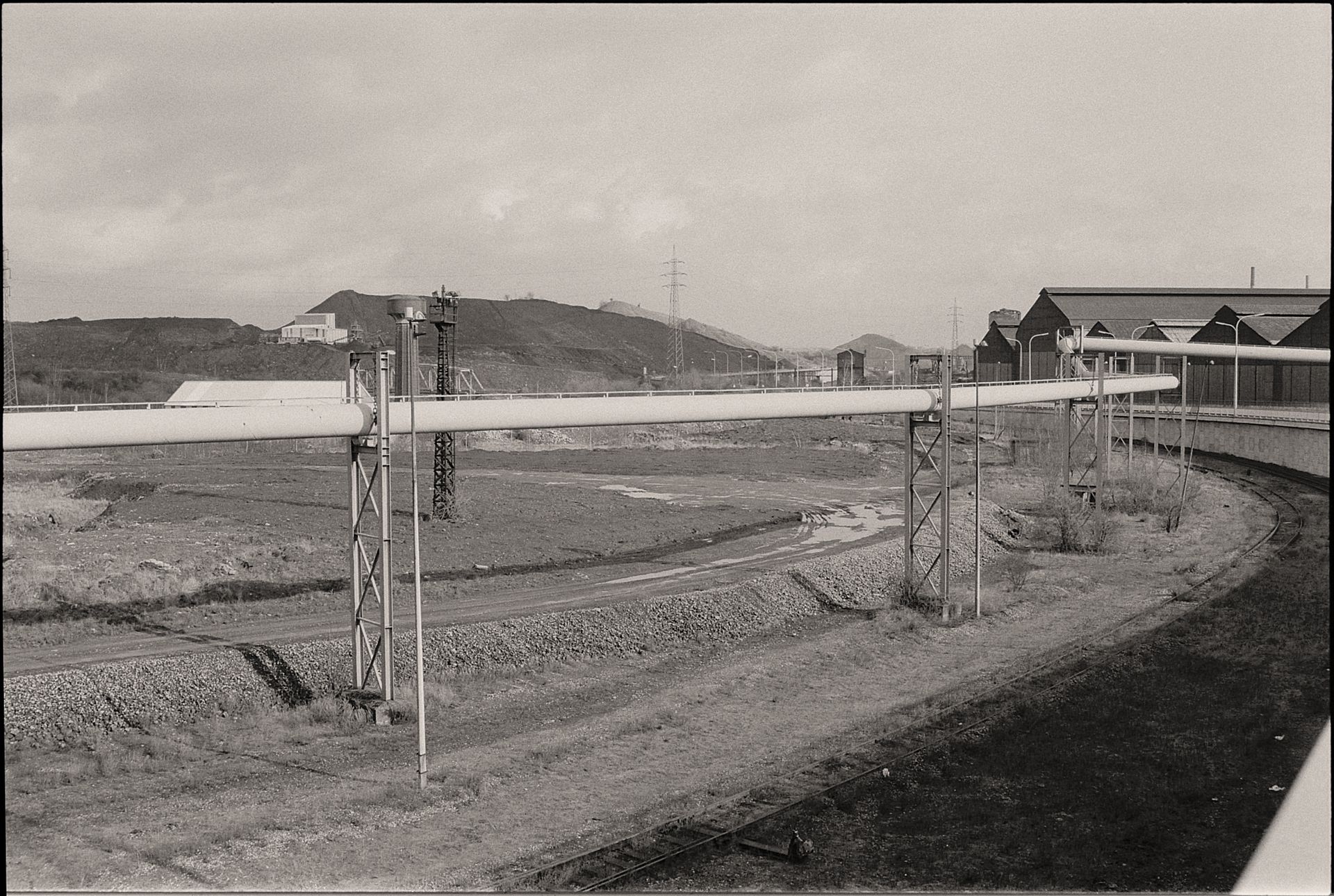 Overhead Pipeline and Narrow-gauge Railway Tracks at the Factory