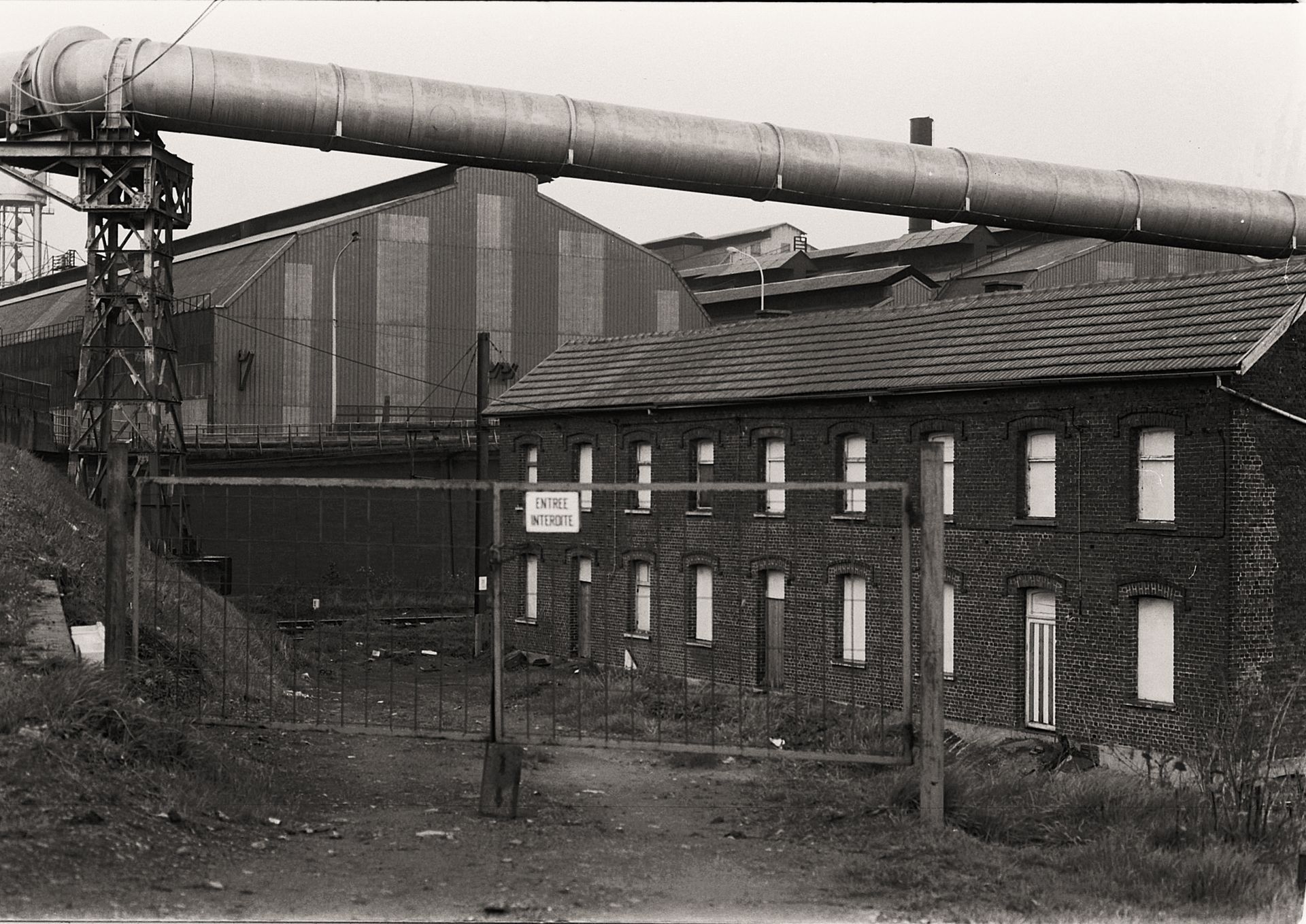 Closed Gate to Factory in Black and White