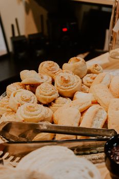 A variety of freshly baked pastries elegantly displayed on a platter, perfect for breakfast or a snack.