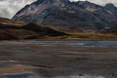 Free Explore the breathtaking Andean scenery with majestic mountains and tranquil lakes in Catac, Peru. Stock Photo