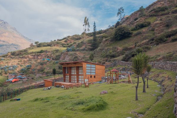 Majestic mountain ridges surrounding the Ayni Kawsay retreat site