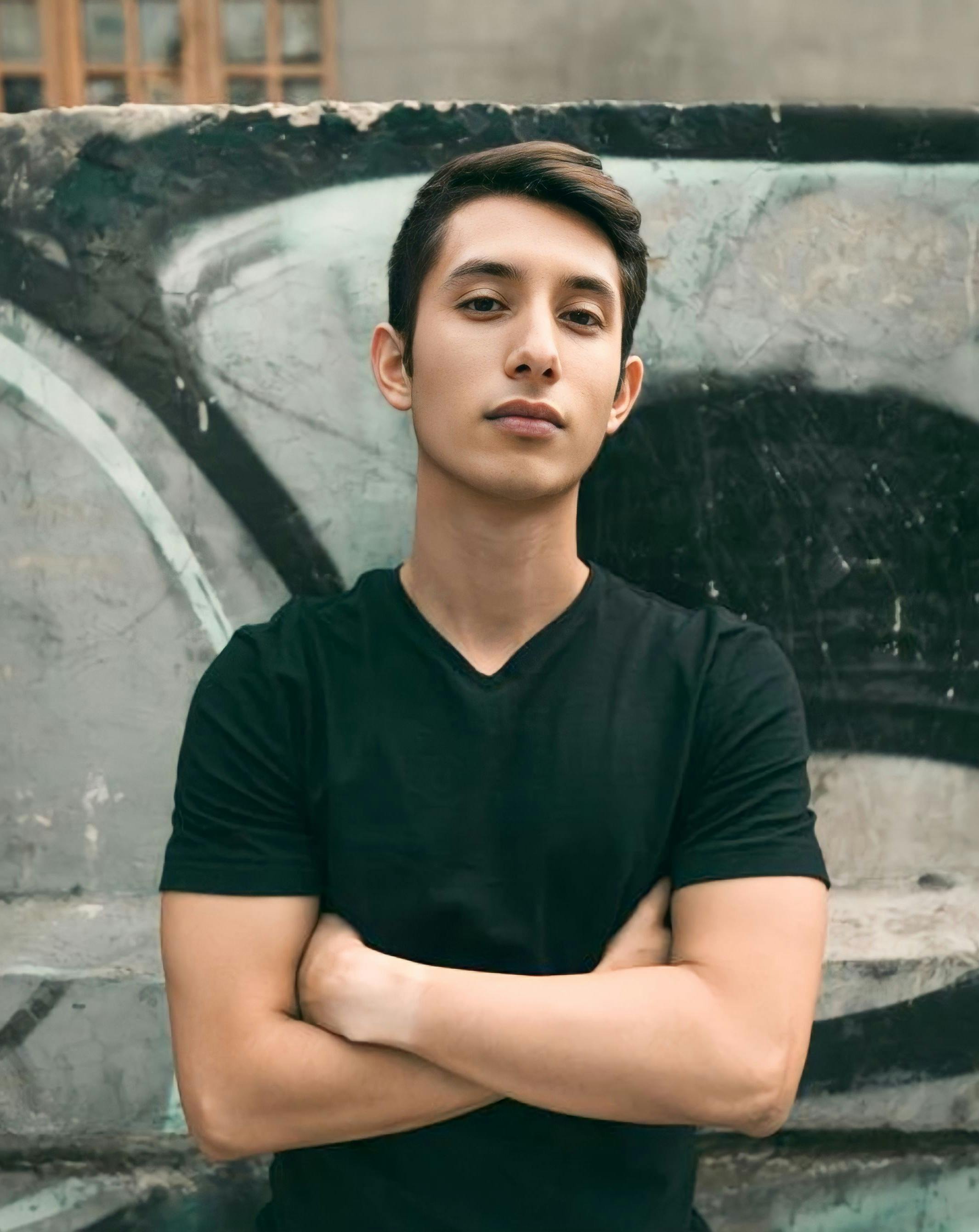 Portrait of a Man on a Street in Front of a Graffiti · Free Stock Photo Portrait of a Man on a Street in Front of a Graffiti · Free Stock Photo