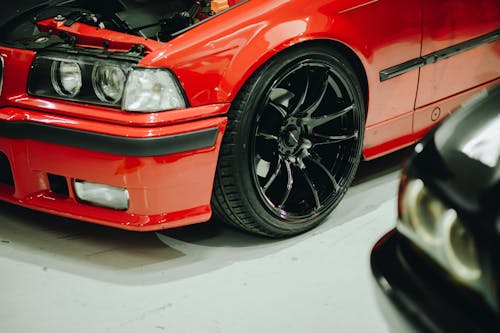 Close-up of the Front of a Red BMW E36