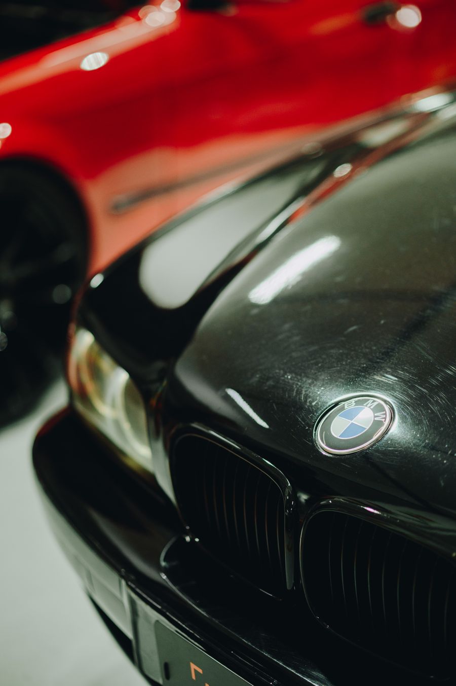 Close-up of clean car hood with reflection