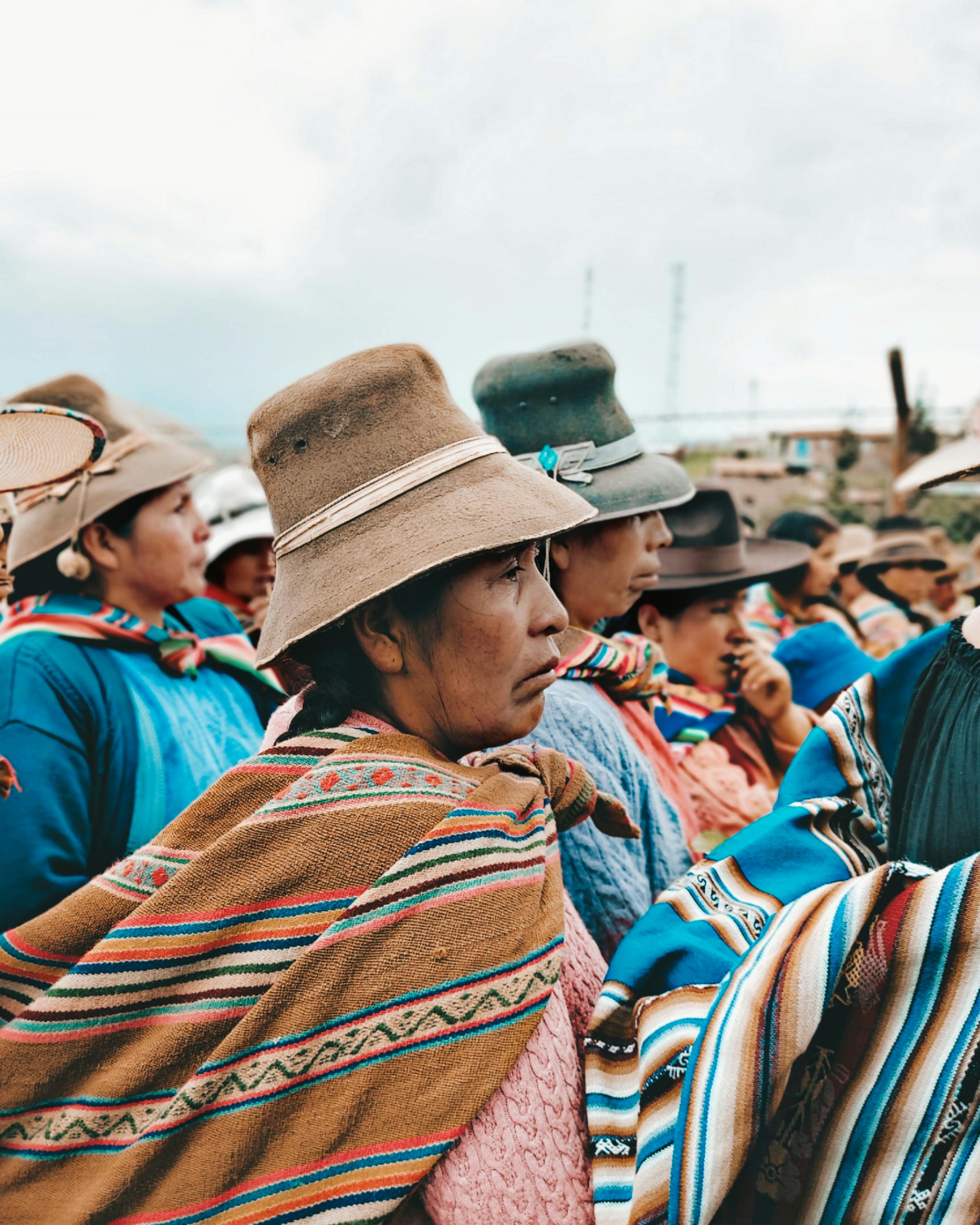 people in traditional clothing and ponchos