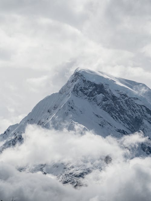 Clouds over Mountain in Snow