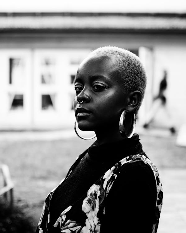 Grayscale Photography Of Woman In Floral Dress · Free Stock Photo