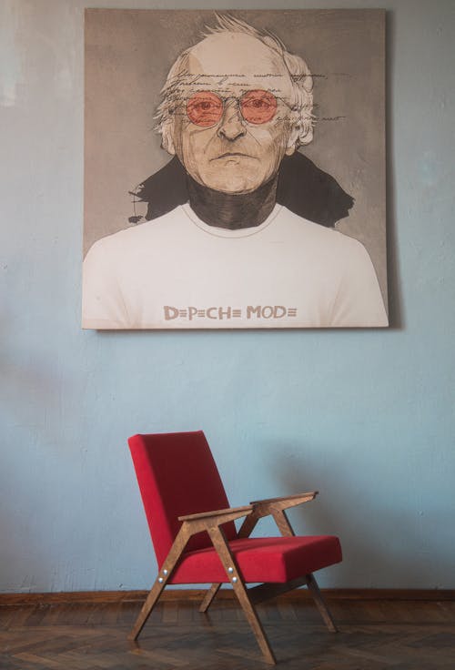 Armchair under Image on Wall