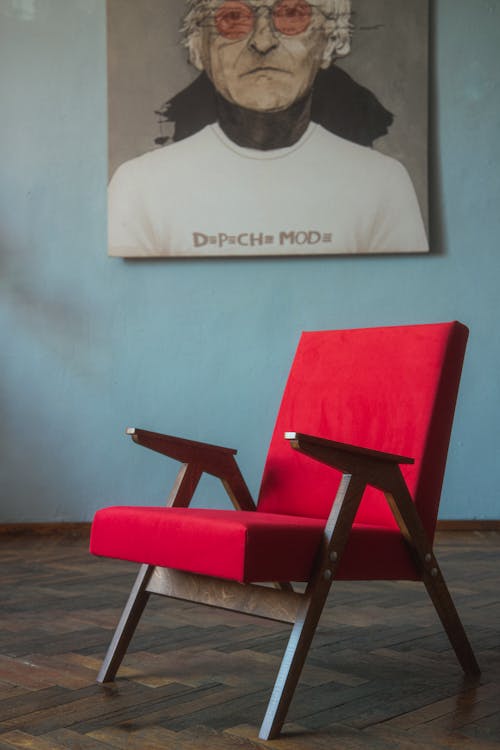 Free Empty Armchair near Image on Wall Stock Photo