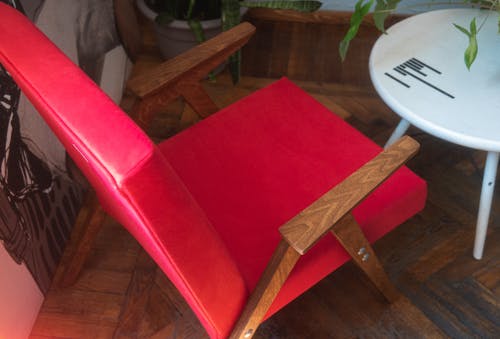Free Red Armchair near Table Stock Photo