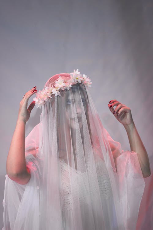 Bride Wearing Veil in a Studio 