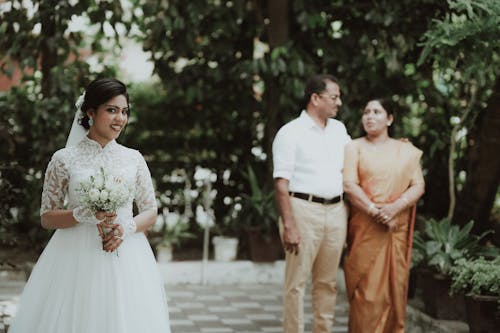 Smiling Bride with Bouquet