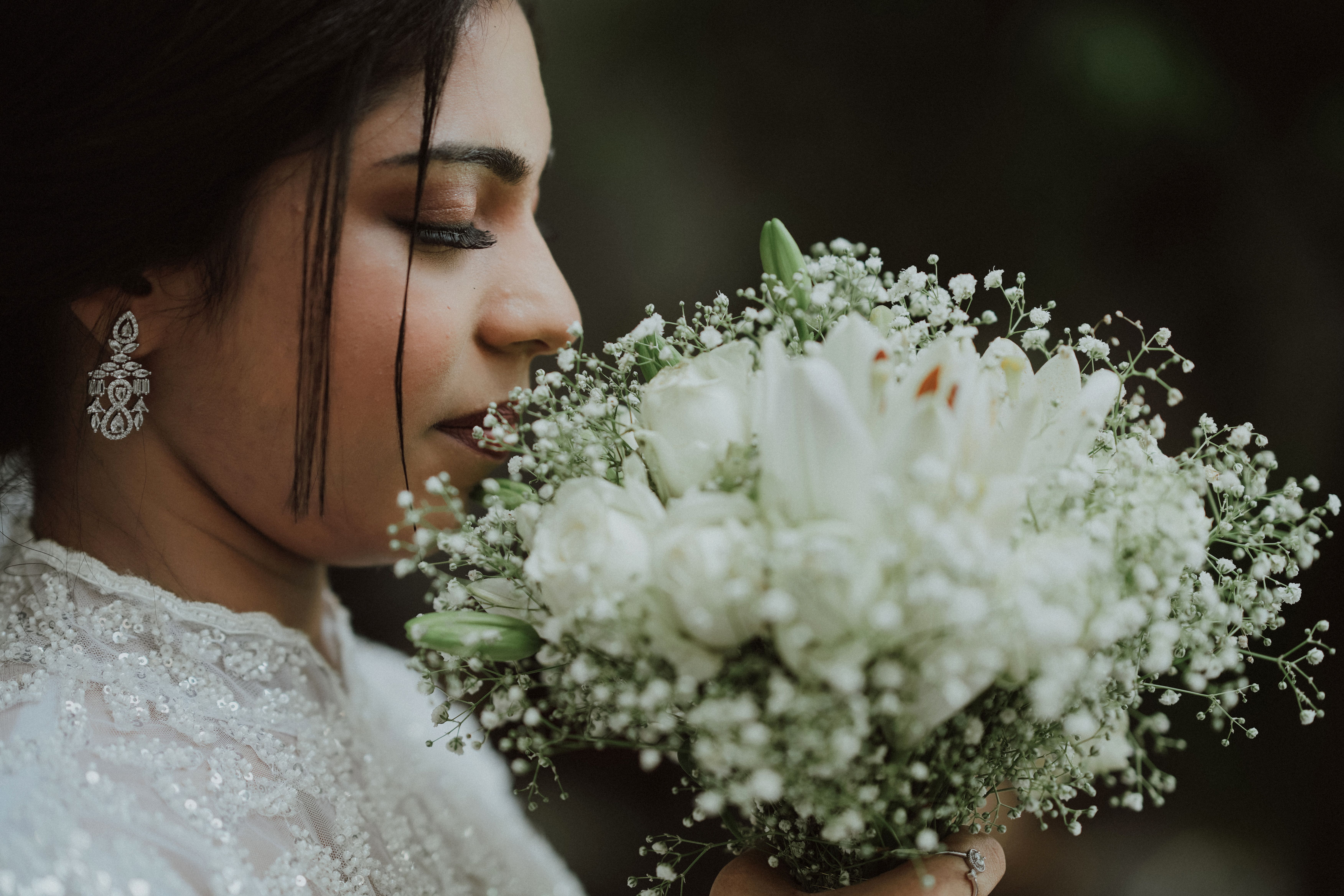 Portrait of a Bride with a Bouquet of Flowers · Free Stock Photo