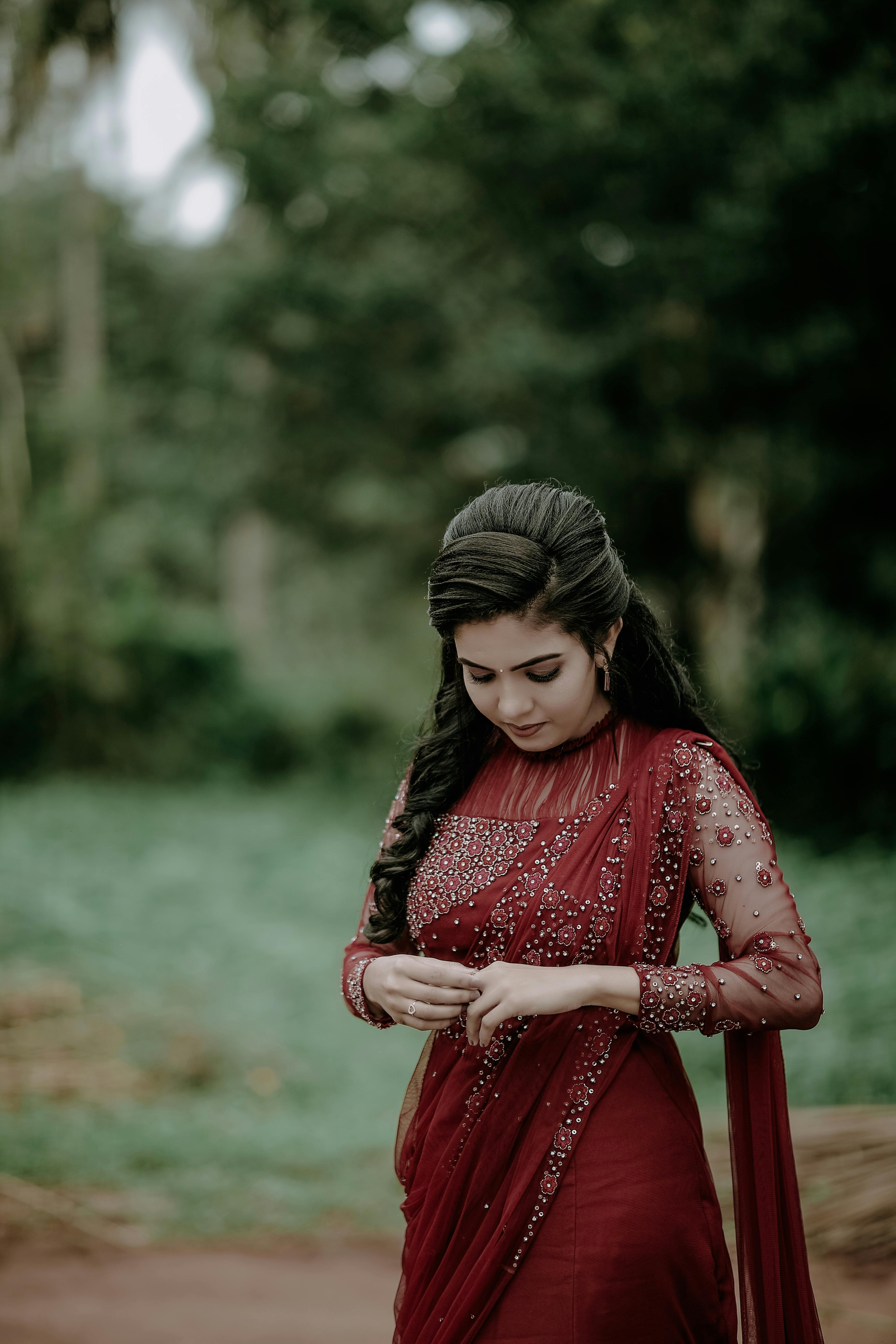 Premium Photo | Cute girl confidently posing alone on mountain hill wearing  traditional desi dress