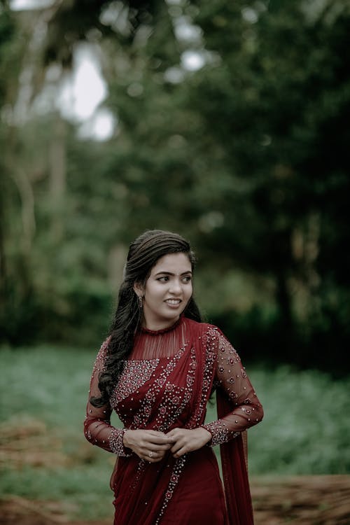 Woman Posing in Red, Traditional Clothing