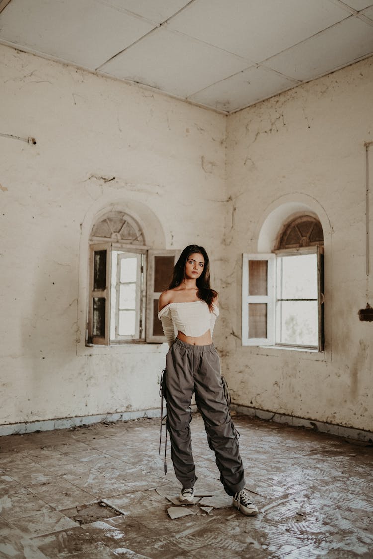 Woman Posing In Abandoned Room