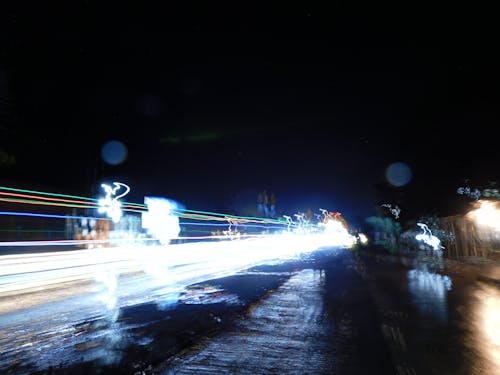 Foto profissional grátis de contra a luz, estrada de tijolos