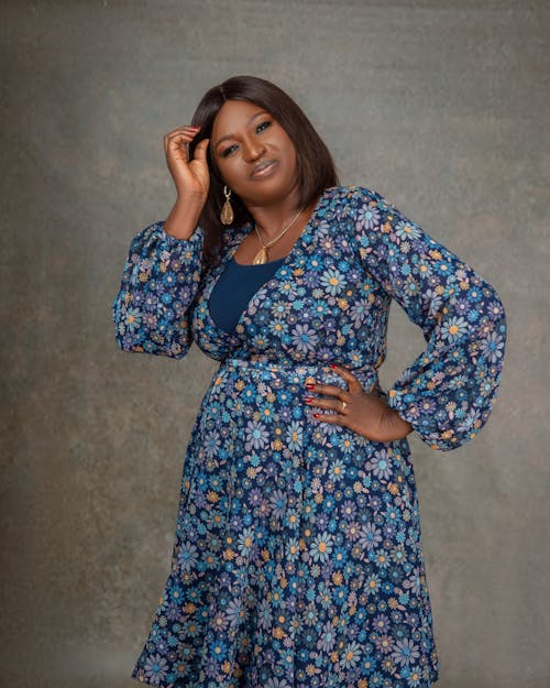 Elegant Woman in a Dress with a Floral Pattern