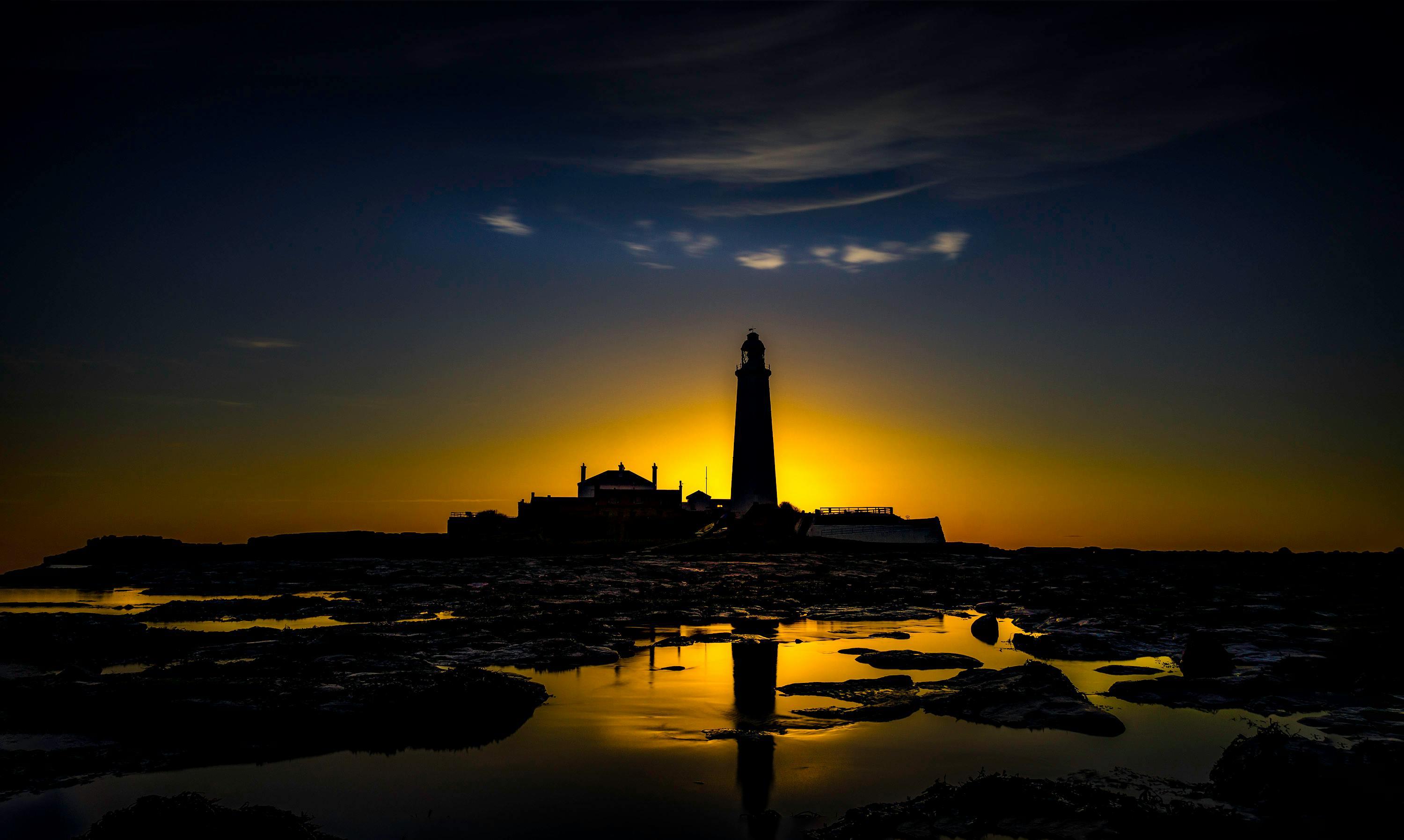 silhouette photo of lighthouse