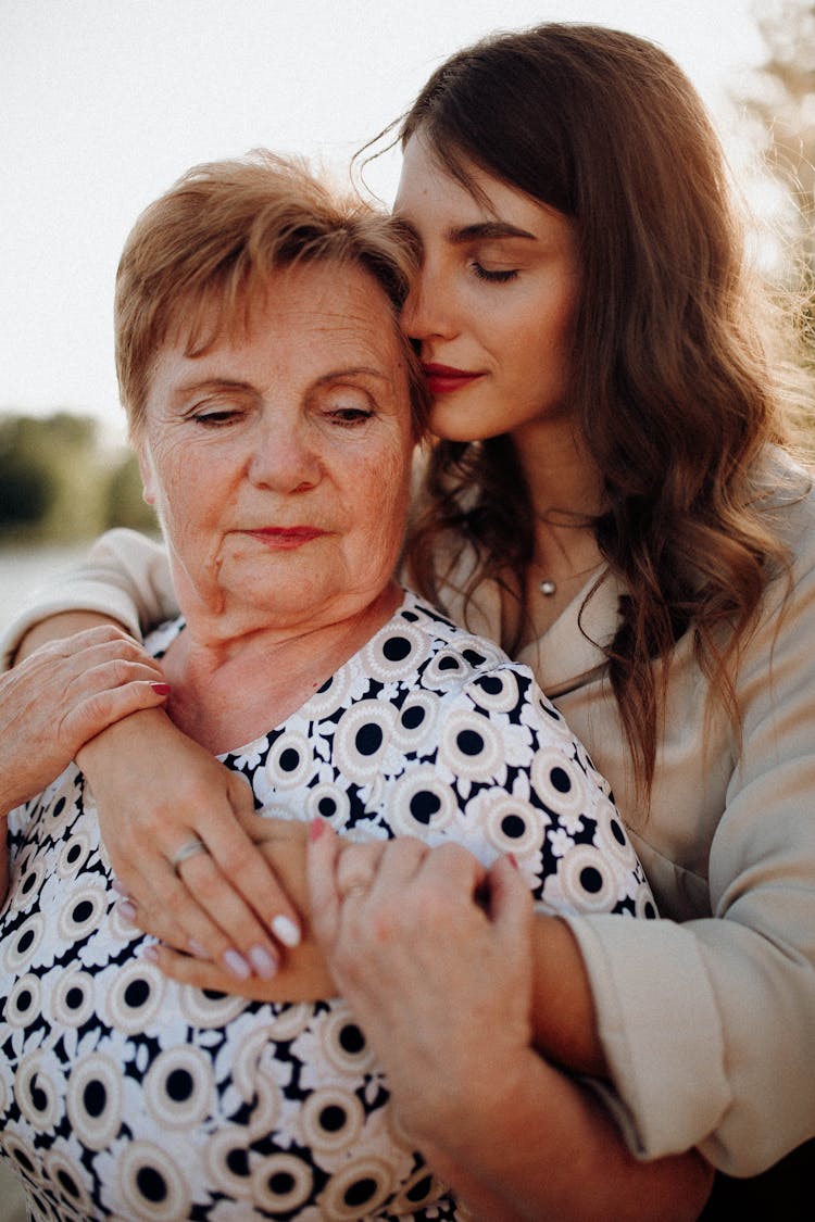 Mother And Daughter Hugging 