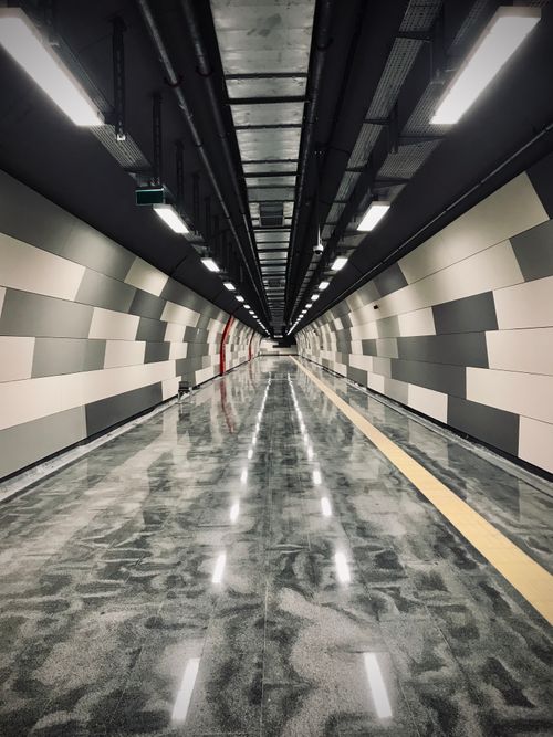 Free Sleek and empty underground tunnel in İstanbul with modern lighting. Stock Photo