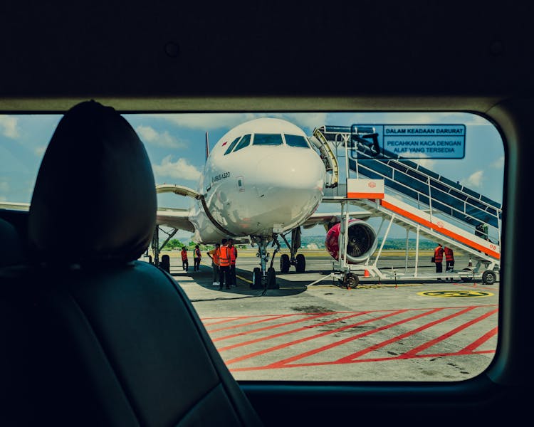 Airplane Behind Window