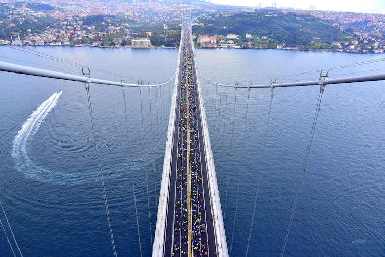 People On A Suspension Bridge In New York 