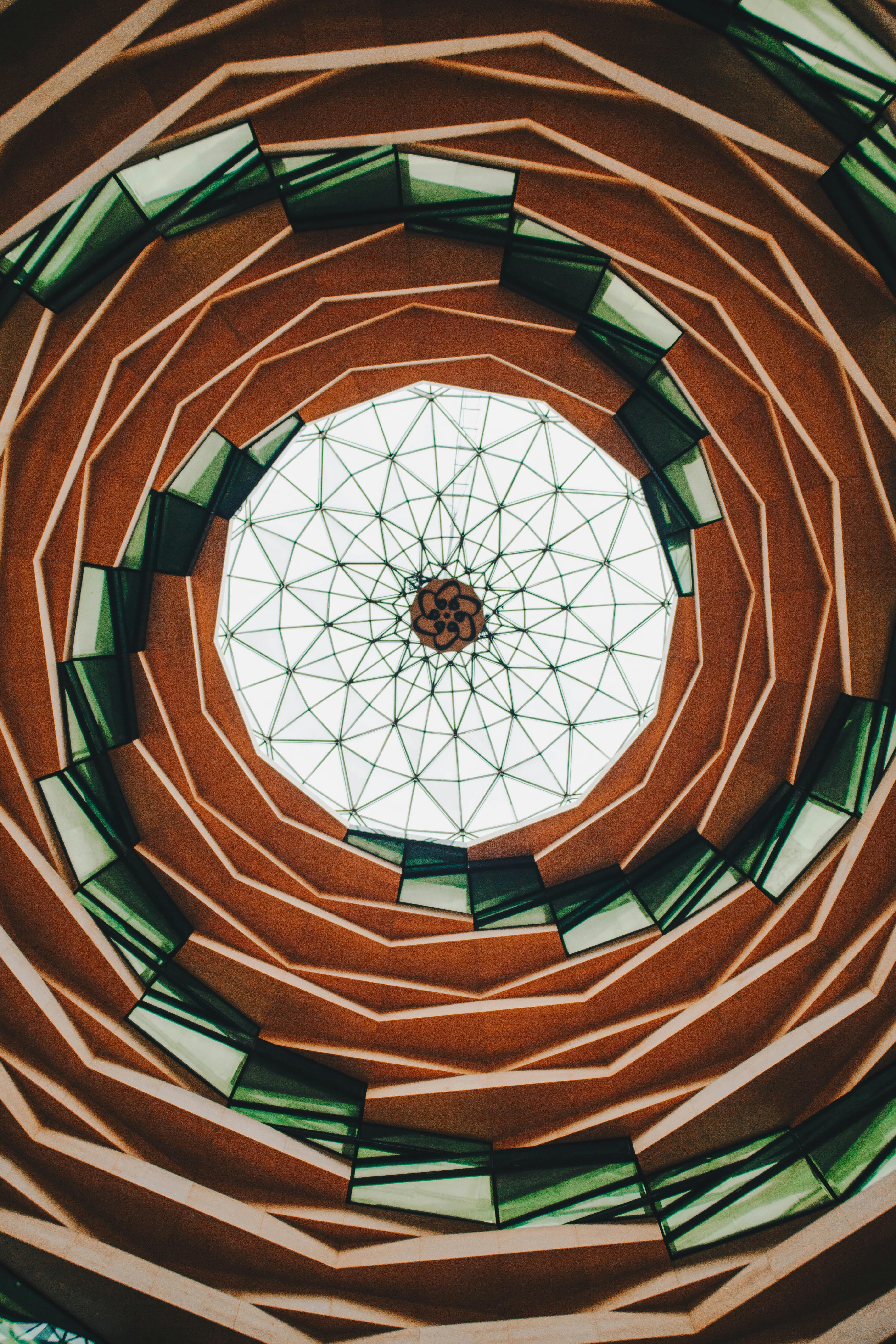 A captivating view of a geometric dome structure from below, showcasing intricate patterns in Istanbul, Turkey.
