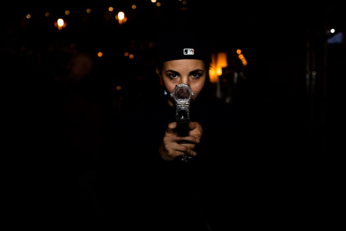 woman holding a handgun