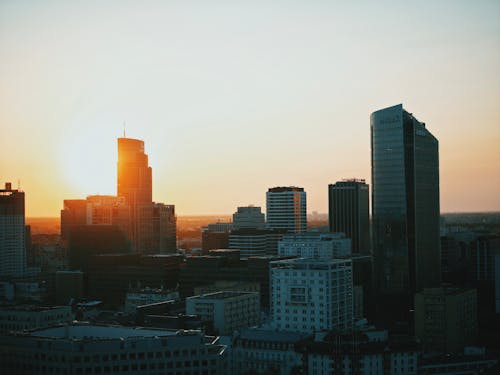 Free Skyline of a Modern City at Sunset  Stock Photo