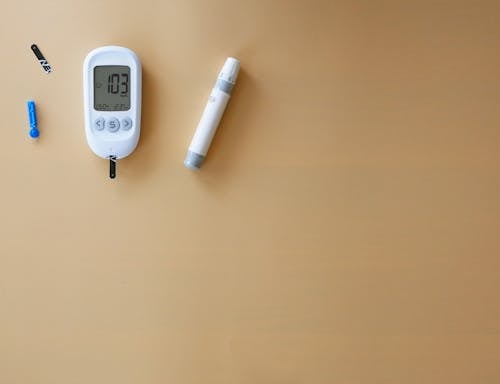 A blood sugar meter and a blood pressure monitor