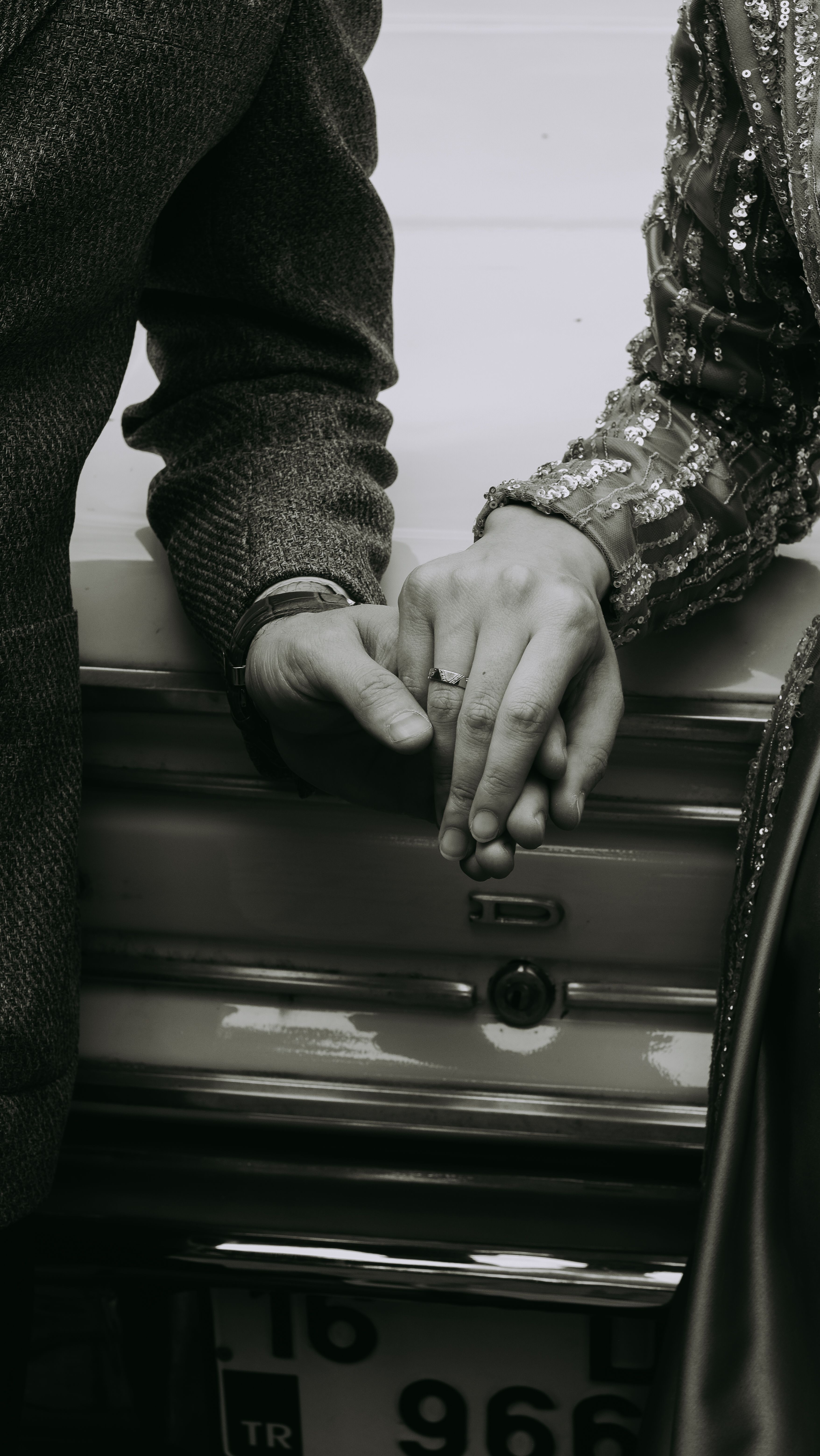 Black and White Photo of a Couple Holding Hands · Free Stock Photo