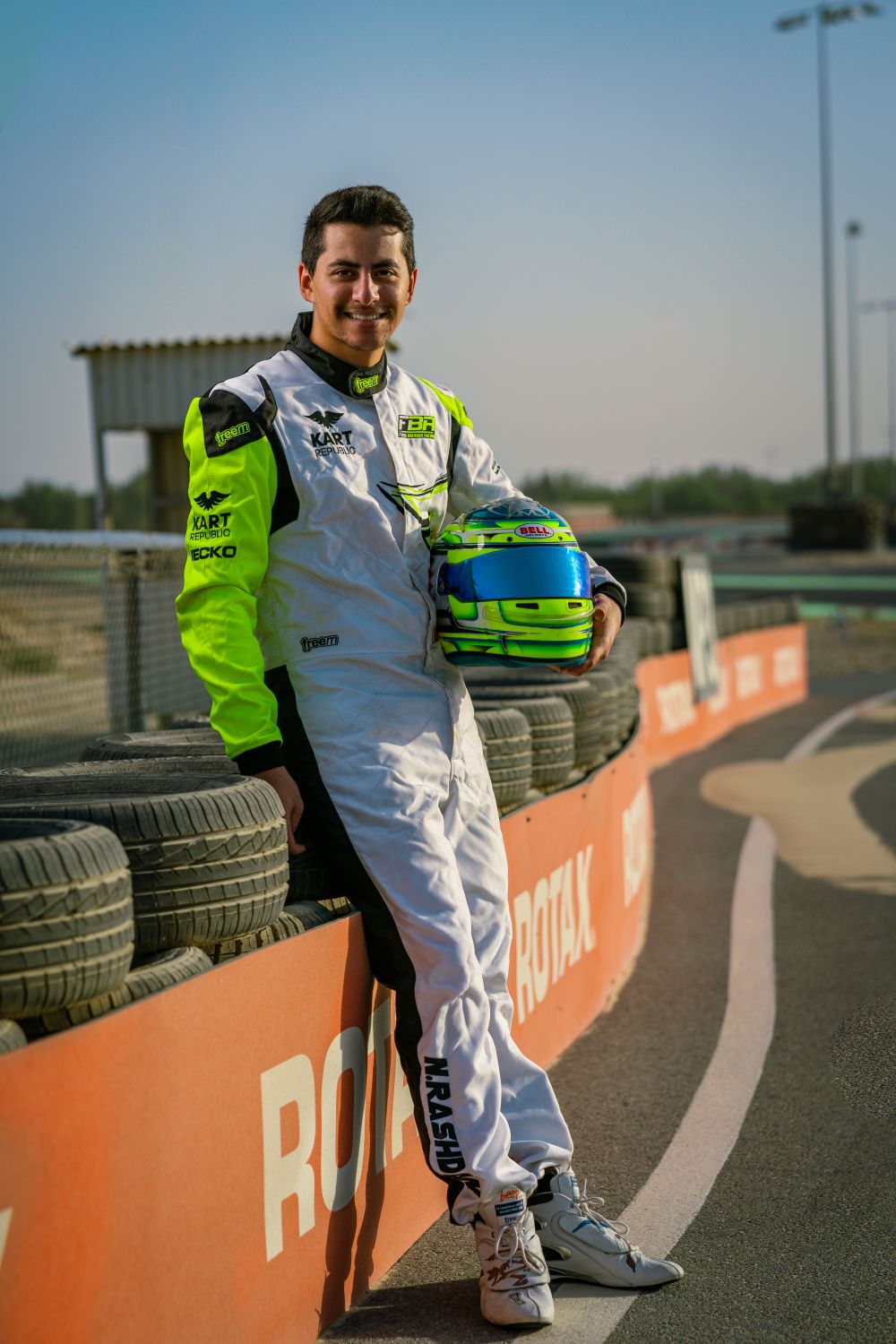Car Race Driver Posing on Racing Track · Free Stock Photo