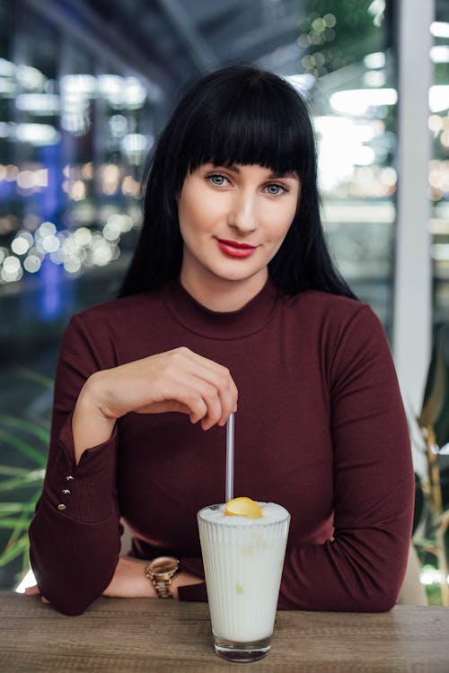 Free Woman Stirring Drink Stock Photo