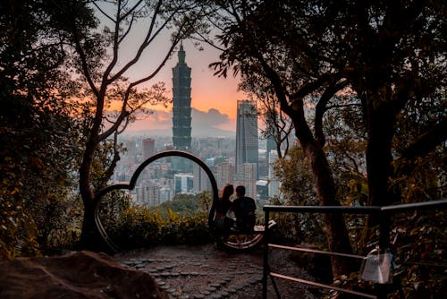 Couple Watching Sunset over Taipei on Top of Xiangshan (Elephant Mountain)