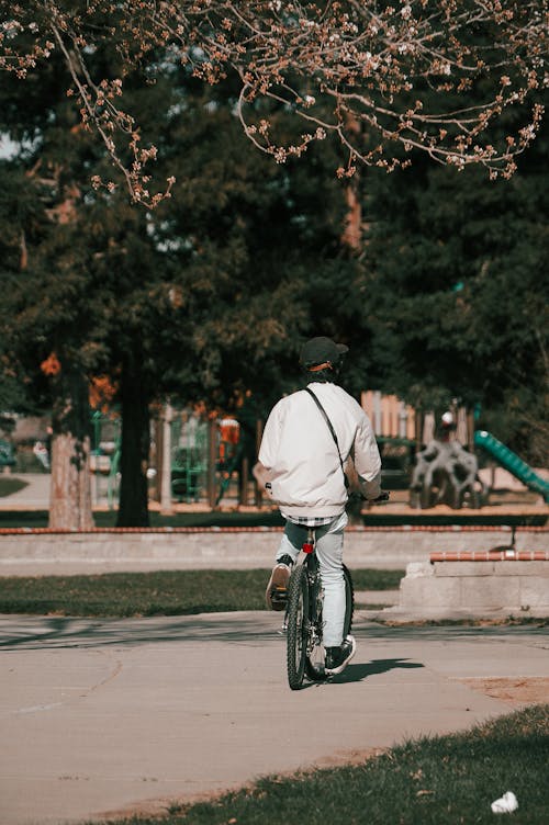 Man Riding Bike at Park